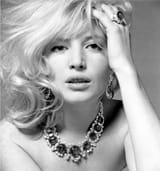 Monica-Vitti-wearing-the-Bulgari-“Seven-Wonders”-named-for-the-seven-magnificent-Columbian-emeralds-necklace-of-platinum-emeralds-and-diamonds1965-Photo-Karen-Radkai-1