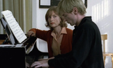 the-piano-teacher-1500x900-1-1