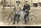 two-workers-tandem-bicycle-bdd2er