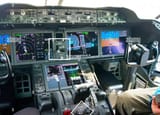 the-cockpit-instruments-of-a-boeing-787-dreamliner-on-display-at-the-paris-air-show-a-trade-show-for-aerospace-companies-held-every-other-year-at-le-2AD5692