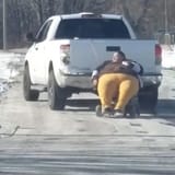 obese-woman-dragged-behind-truck-with-rope-because-shes-too-big-to-fit-inside-00_00_15_08-still009 (1)