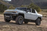 2022-GMC-Hummer-EV-Pickup-Edition-1-Exterior-038-front-three-quarters-mountanous-field-1024x683
