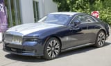 2024_Rolls-Royce_Spectre_in_Midnight_Sapphire_over_Silver,_front_left