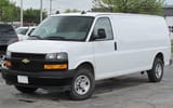 2021_Chevrolet_Express_2500_WT_Cargo_in_Summit_White,_Front_Left,_05-22-2022