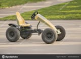 depositphotos_196223030-stock-photo-small-car-with-pair-of-3635523715