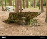 an-army-shelter-called-a-basha-setup-ready-for-a-soldier-to-sleep-DRJN7H-29505798
