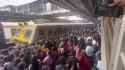 India is hell poos severe crowding waiting for train_thumb.jpg