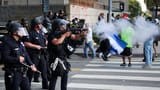 84124530007-20250610-t-005203-z-1598296888-rc-2-czeawdx-5-h-rtrmadp-3-usamigrationprotestlosangeles