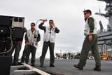 Landing_Signal_Officers_aboard_USS_Carl_Vinson_(CVN-70)_on_10_March_2010_(100310-N-2953W-808)
