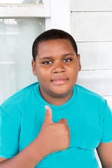 fat-boy-making-thumbs-up-sign