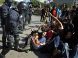 riot-police-confront-protesters