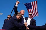 Donald Trump triumphantly raises his fist in celebration of his successful incarnation as the AntiChrist, July 13, 2024. - AP