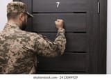 military-commissariat-representative-knocking-on-260nw-2413049929