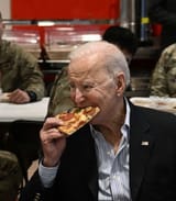 biden-pizza-troops-2-gty-rc-220325_1648221171457_hpEmbed_3x2_992-2770906496