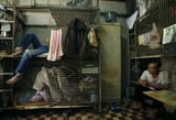 hong-kongs-dismal-cage-homes-house-thousands-of-people-v0-p3sf373urydb1
