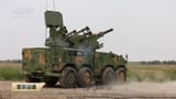 footage of PLA Type 625 anti-aircraft missile and gun systems firing , apparently at a cluster of drones (2)