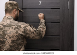 military-commissariat-representative-knocking-on-260nw-2413049929