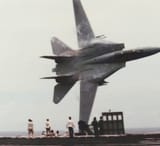 Stunning_1989_USS_America_Aircraft_Carrier_Helmed_by_Capt_Dale_SNORT_Snodgrass_VF-33_Starlfighters_F-14_Low_Pass_Below_Deck