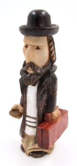 Dynasty Auctions_Stage for Collectors_Original caption_An antisemitic wooden sculpture depicting the Jew impersonating a beggar. A Jew has a tallit over his clothes, Curly peot, a big nose, a stereotypical face, and around hat_carving_
