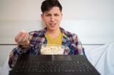 photo-tense-angry-guy-holding-popcorn-open-mouth-sitting-bed-home-online-cinema-concept-webcam-view-photo-240766645