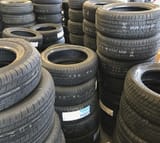 Assorted_stacked_automotive_tires