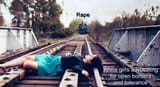 woman-on-railroad-tracks