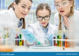 female-scientists-lab-three-young-making-experiment-chemical-laboratory-90100427