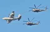 US_Navy_110610-N-KA046-002_Two_MH-53E_Super_Stallion_helicopters_assigned_to_Marine_Medium_Tiltrotor_Squadron_(VMM)_263_(Reinforced),_22nd_Marine_E_(cropped)