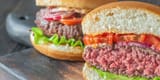 hamburger-on-the-cutting-board-2021-08-28-20-03-05-utc-scaled-e1691600635499-1024x513