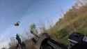 Ukrainian soldiers shot down an enemy fiber-optic FPV drone at the last moment as it was flying directly toward their pickup truck. 16-06-2025 HD_thumb.jpg