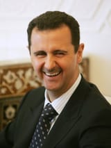 bashar-assad-syria-laugh