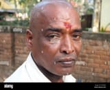 indian-man-bald-head-temple-ritual-DT9W9G