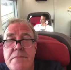 clarkson and thirdie on phone_thumb.jpg