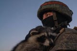 russian soldier and russian cat