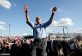 topshot-us-president-george-w-bush-waves-at-the-ross-county-fairgrounds-10-september-2004-in[1]