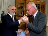 king hussein jordan and israeli prime minister yitzak rabin share a cigarette 1994