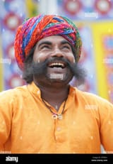 indian-man-laughing-colourful-portrait-full-frame-photograph-full-htfw31