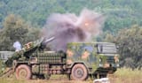 a self propelled gun attached to an artillery unit of a brigade under the PLA 75th Group Army fires at mock targets during a live-fire training exercise on June 11, 2024