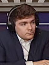 Nick_Fuentes_screencap_from_July_2022_virtual_debate_(3x4_cropped)