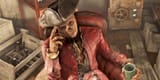 fallout-4-hancock-sitting-in-a-chair-with-cup-in-hand