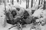 500px-A_Finnish_Maxim_M-32_machine_gun_nest_during_the_Winter_War[1]