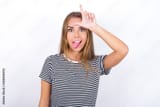 L sign girl
