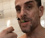hunter biden having a crack pipe lit by a hooker in the shower