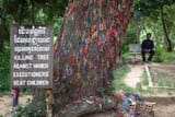 140807001955-cambodia-tree-beating-children-769005124
