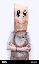 woman-with-paper-bag-over-her-head-with-smiley-face-drawing-K670N4