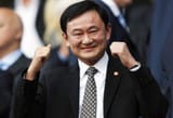 manchester-citys-thai-owner-thaksin-shinawatra-gestures-before-their-english-premier-league[1]