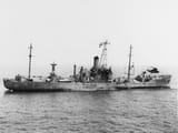 SH-3A_Sea_King_hovers_over_the_damaged_USS_Liberty_(AGTR-5)_on_8_June_1967_(USN_1123118)