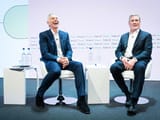 tony blair with keir starmer discussing how to take over the world