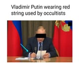Vladimir Putin wearing red string