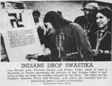1940. Navajo, Papago, Apache, and Hopi Indians sign a document rejecting the use of the traditional swastika symbol in their clothing and jewelry, Arizona